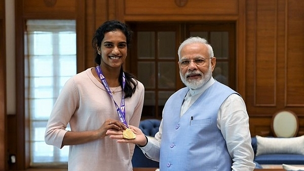 P V Sindhu with PM Modi. (image via @narendramodi/Twitter)