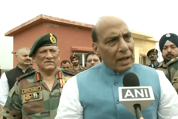 Defence Minister Rajnath Singh (R) and COAS General Bipin Rawat (L). (@ANI/Twitter)