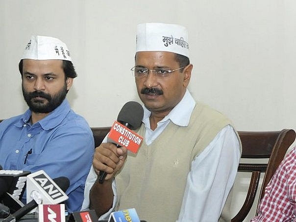 Arvind Kejriwal with Ashish Khaitan (L) (Sushil Kumar/Hindustan Times via Getty Images)