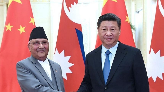 Nepali PM K P Oli with Xi Jinping. (via Twitter)