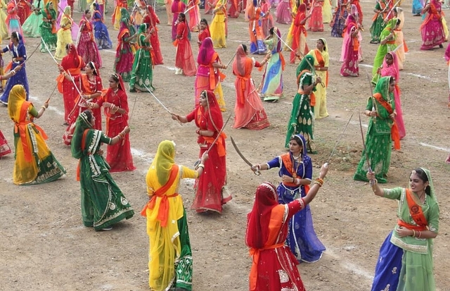 The Bhawanis performing the <i>talwaar raas</i>.