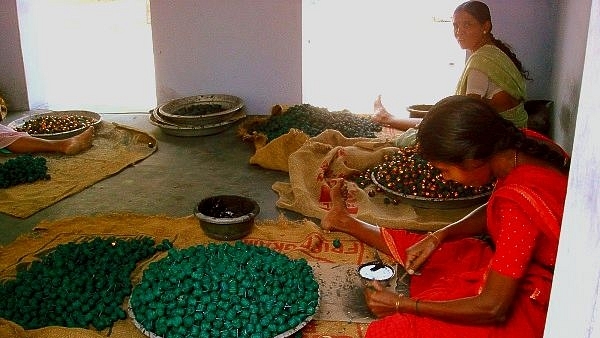 Workers at Shivkasi making environment-friendly firecrackers.