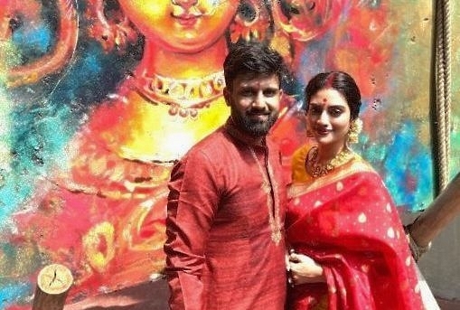 Nusrat Jahan, Basirhat MP, with her husband during Durga Puja festivities.