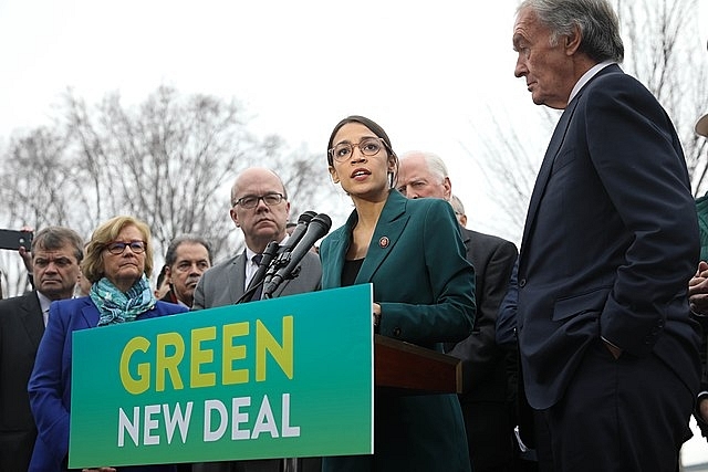 US Congresswoman Alexandria Ocasio-Cortez (Middle) at Green New Deal Presser (Senate Democrats/Wikimedia Commons)