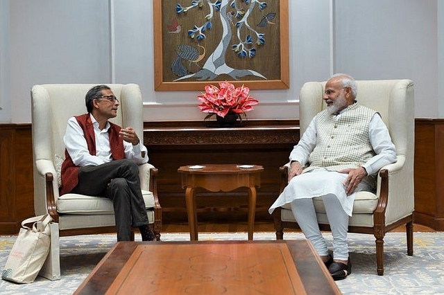 PM Modi with Abhijit Banerjee. (via Twitter)