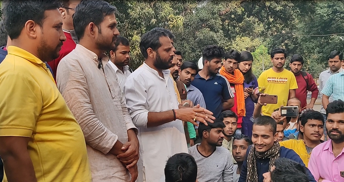 Students leading the protests addressing others at the dharna site on 21 November