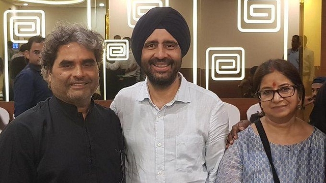 Gurmit Singh (centre). (via Twitter)