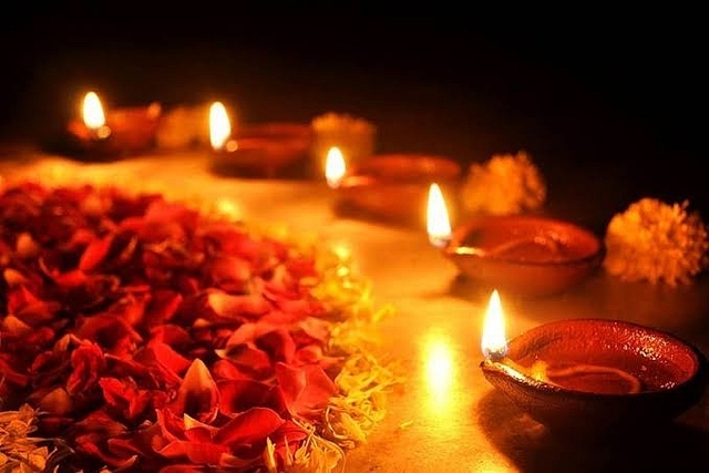 Lamps lit for puja.