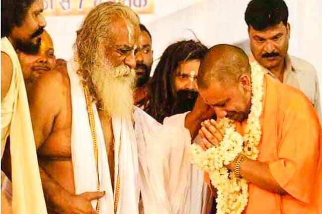 Mahant Nritya Gopal Das with UP CM Yogi Adityanath (Representative Image) (Pic Via Facebook)