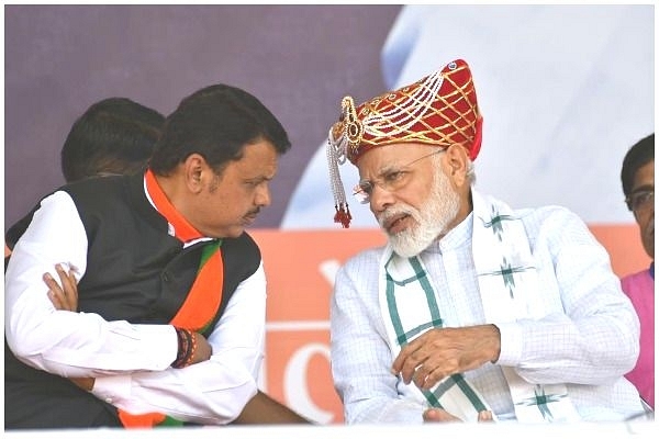 Devendra Fadnavis with Prime Minister Narendra Modi at an election rally in Maharashtra. (BJP4Maharashtra/Twitter)