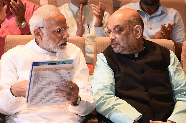 Prime Minister Narendra Modi with Union Home Minister Amit Shah. (Vipin Kumar/ Hindustan Times via Getty Images)&nbsp;