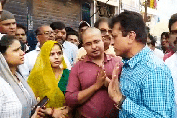 Kirit Somaiya meeting the victim’s family