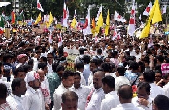 A demonstration against the CAA in Assam. (Rajib Jyoti Sarma/Hindustan Times via GettyImages) 