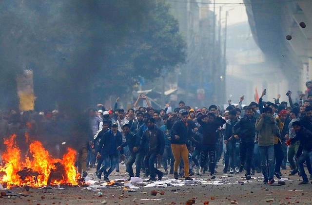 Representative Image -- A still from the anti CAB protests turning violent in Seelampur Delhi (Source: Twitter)