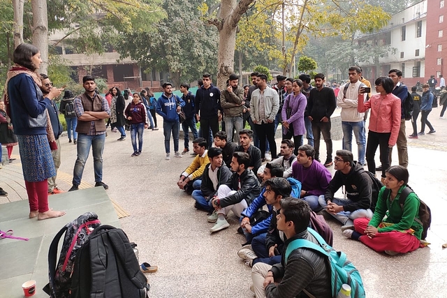 Deepika Sharma, left,  addressing students at a remembrance meeting for Kashmiri Hindu exodus victims held at Hindu College on 20 January 2020.