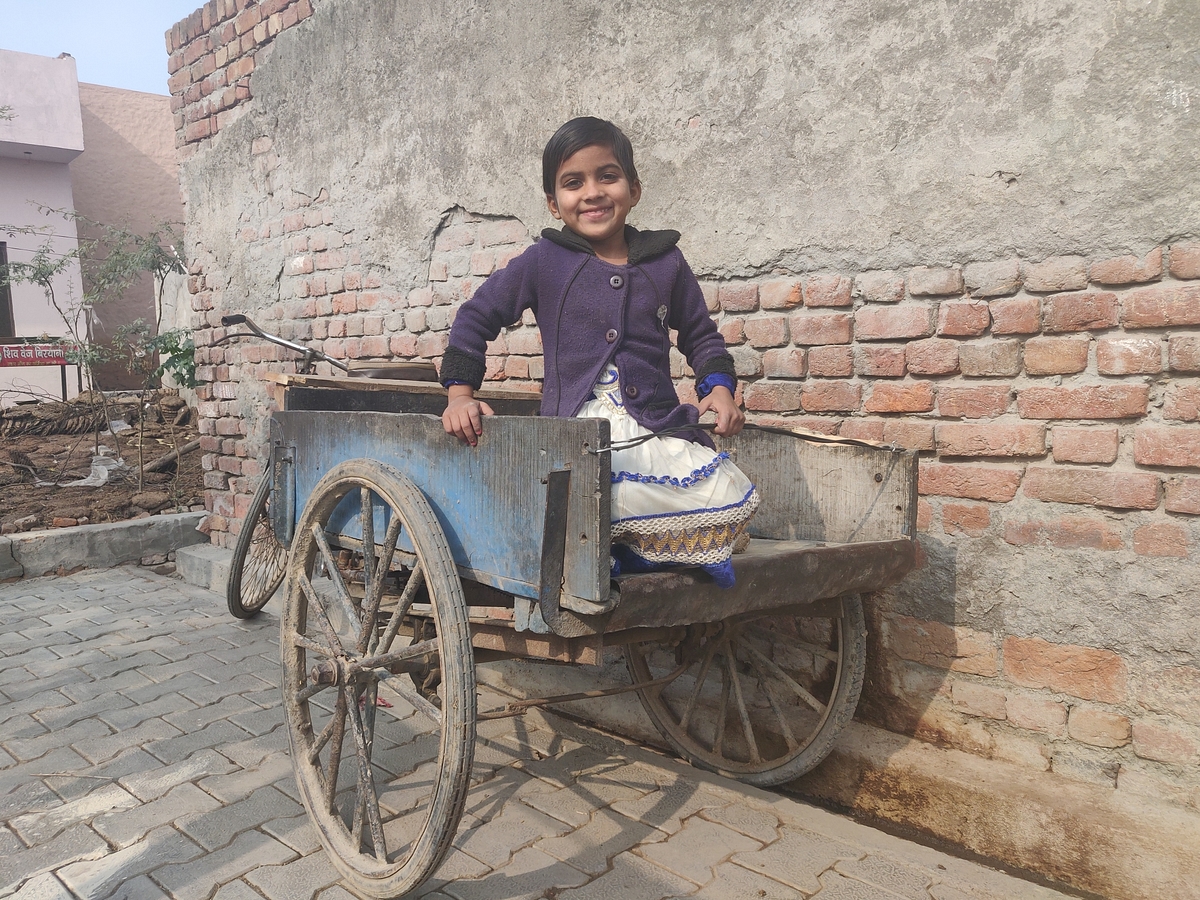 Lokesh’s daughter on her father’s handcart