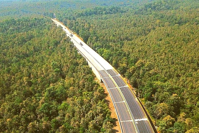 A highway through woods.&nbsp;