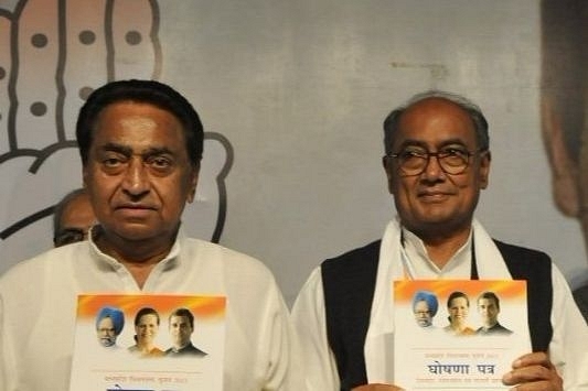 MP CM Kamal Nath (L) with state leader Digvijaya Singh (Mujeeb faruqui/Hindustan Times via Getty Images)