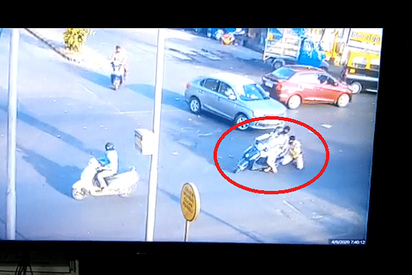 Biker dragging Mumbai cop