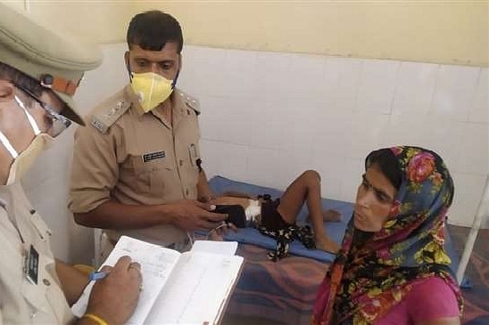 An injured Laali on the bed while her mother gives statement to the police on 20 May. Picture provided by a local reporter