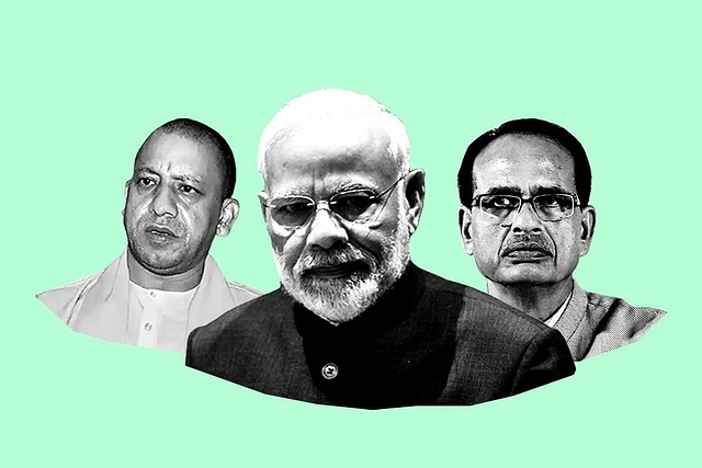 Prime Ministre Modi (center), UP Chief Minister Yogi Adityanath (left) and MP Chief Minister Shivraj Singh Chouhan (right).&nbsp;