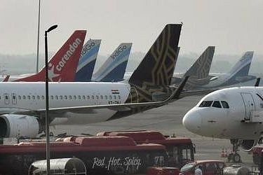 Aircraft parked on the tarmac of an airport.