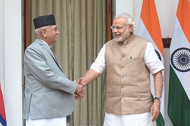 Nepalese Prime Minister Khagda Prasad Sharma Oli with Prime Minister Narendra Modi. (GettyImages)