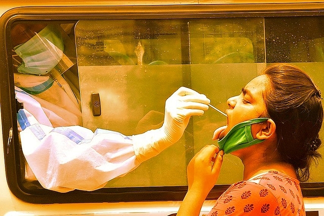 A health worker collects swab sample for Covid-19 test. (representative image)