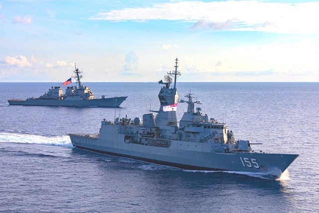 US Navy’s guided-missile destroyer USS John S. McCain sails with Australian Navy’s frigate HMAS Ballarat. (US Indo-Pacific Command/Twitter)