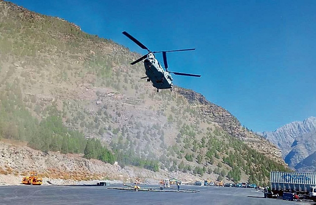 Chinook helicopter lifting the antenna for survey.&nbsp;