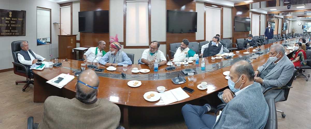 The meeting in which farmers and officials were present.