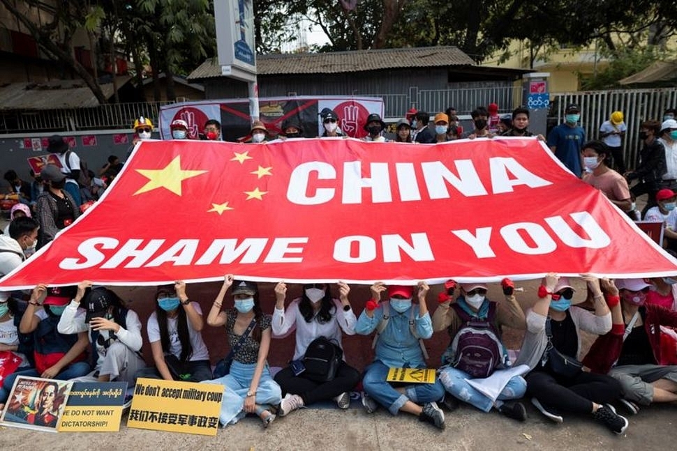 Anti-China Protests In Myanmar As Beijing Seen Supportive Of Military Coup; Dozens Of Chinese Factories Set Ablaze 