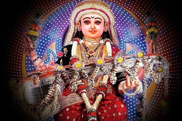 Sharada on her procession pedestal