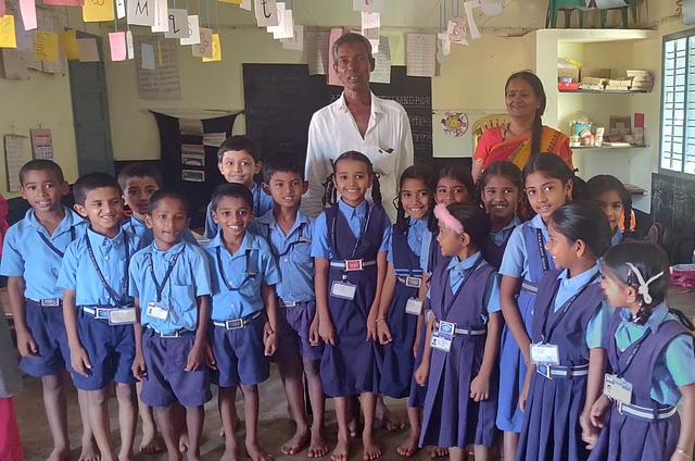 Hajabba with students.