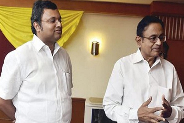  P Chidambaram (right) with his son Karti Chidambaram.
