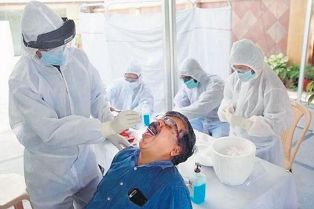 A man getting swabbed