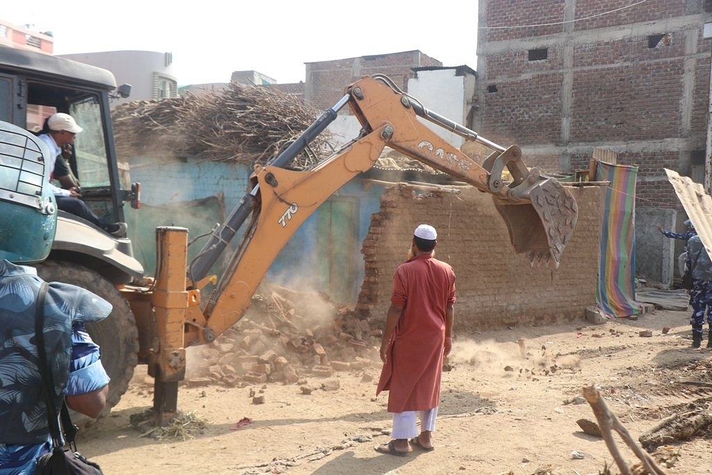 Stills from the demolition drive as posted by PRO Khargone from their official twitter handle 