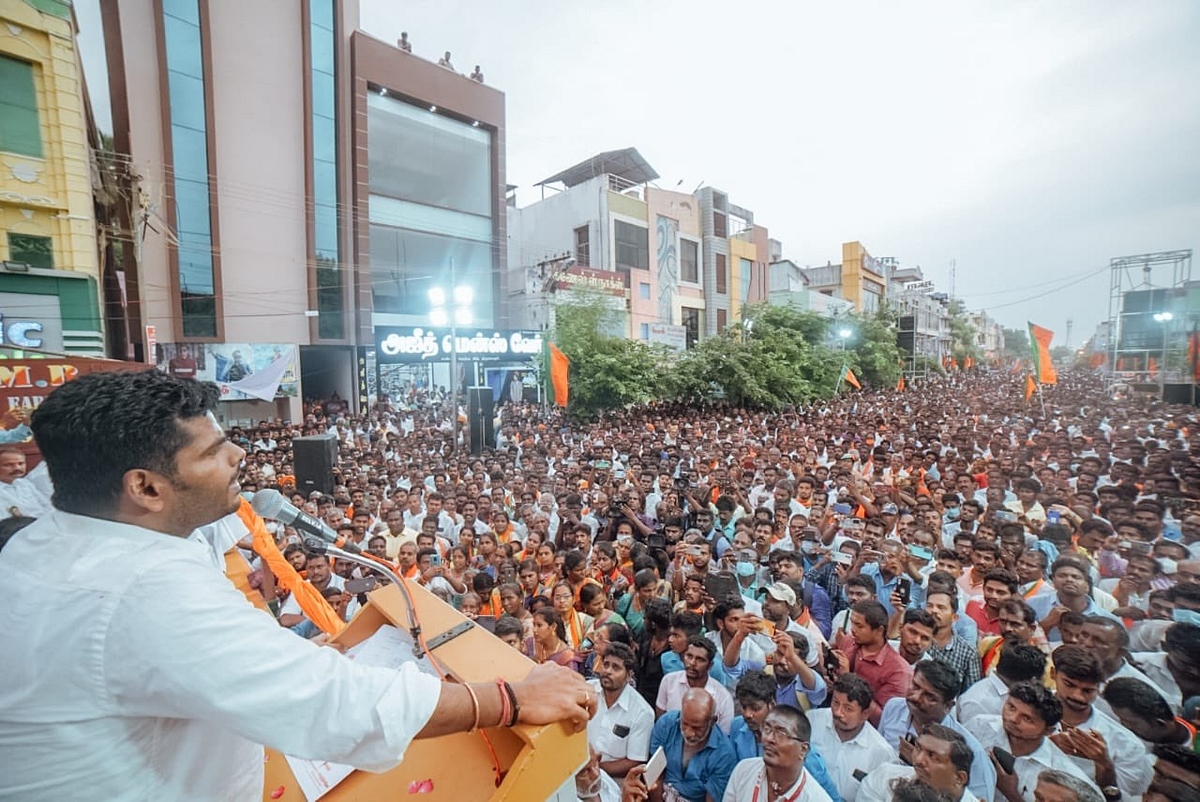 Annamalai speaking to a large crowd of protesters.