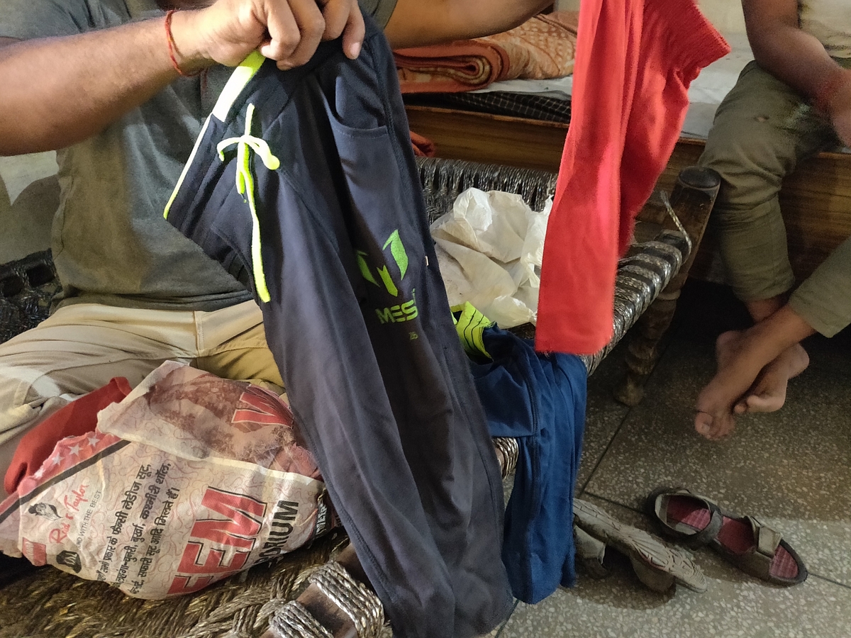 Sanjeev shows the boy’s clothes kept at his office. The boy was made to change clothes before he was taken to the police station 