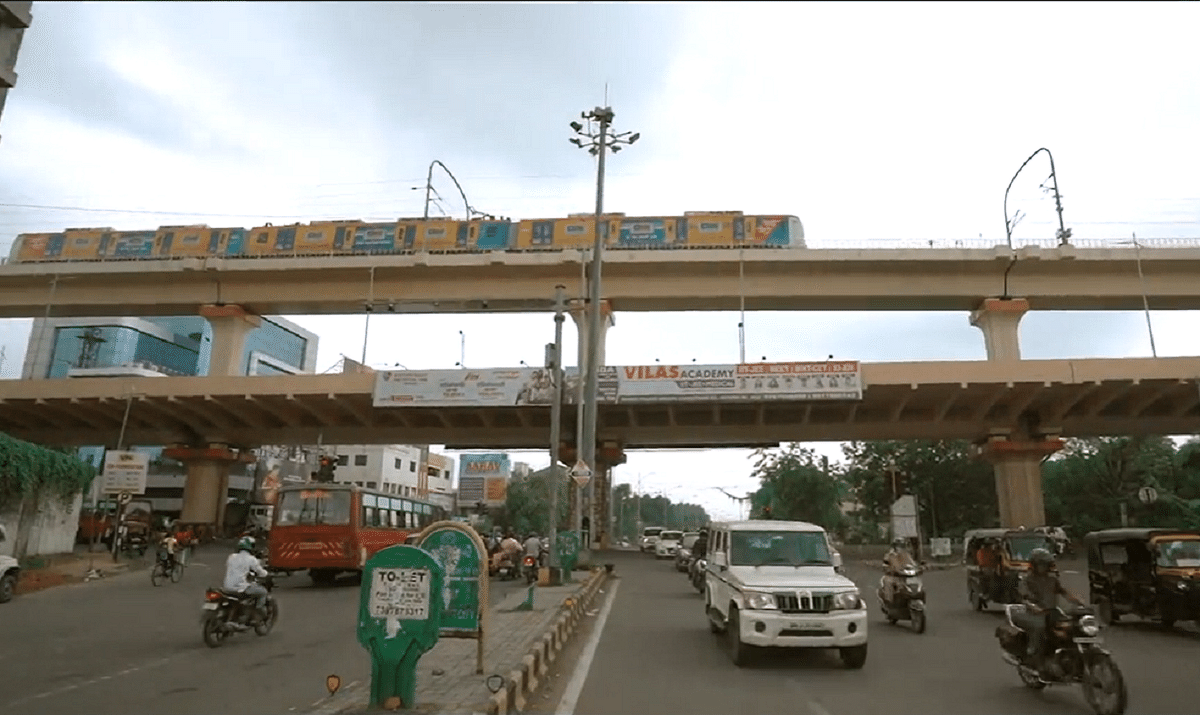 The double-decker flyover with three visible layers of commute (Nagpur Metro)