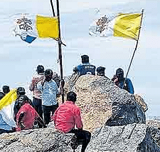 Official Vatican City flag being flown by protesters at Vizhinjam.