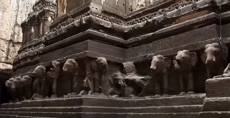 The plinth shown as if being on the back of elephants