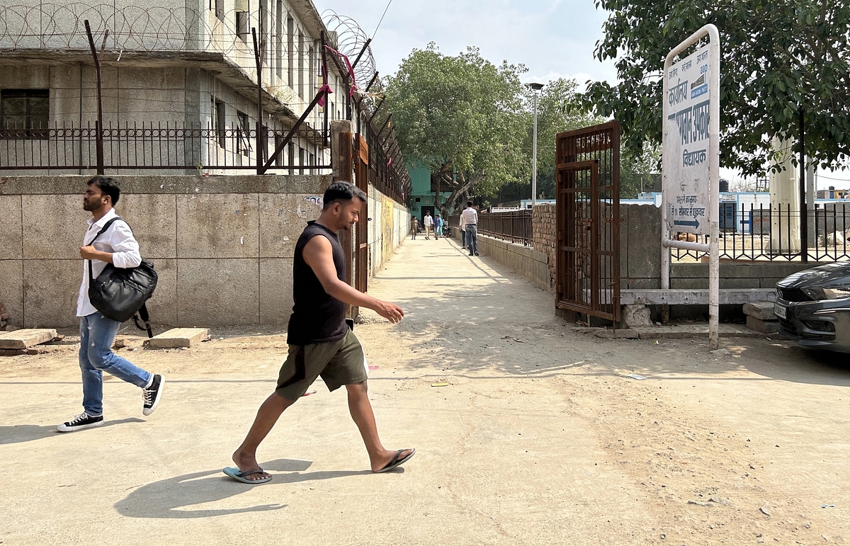 The entrance of the lane in which the murder took place, showing the board of AAP MLA Jai Bhagwan 