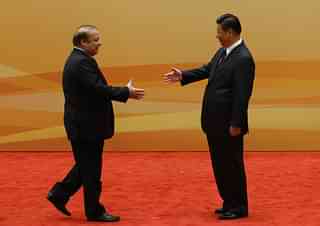 Nawaz Sharif and Xi Jinping shake hands/Photo credits: Getty Images