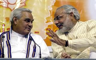 Vajpayee and Modi (Credits: AFP PHOTO/INDRANIL MUKHERJEE)