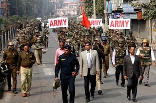 Army conducting flag march in Rohtak. (Photo Credit: STRDEL/AFP/Getty Images)