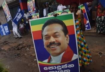 A Mahinda Rajapaks poster. (Credits: AFP PHOTO/ Ishara S. KODIKARA)