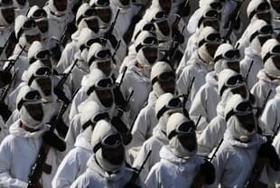 Indian soldiers specially trained to guard the disputed Siachen Glacier, take part in the completely dressed rehearsal of the Republic Day parade in Kolkata on January 22, 2012. India will celebrate its 63rd Republic Day on January 26 with a large military parade and cultural representation all over the country. AFP PHOTO/Dibyangshu SARKAR (Photo credit should read DIBYANGSHU SARKAR/AFP/Getty Images)