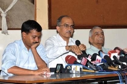 Kejriwal with Shanti and Prashant Bhushan. Source: AFP PHOTO / Sajjad HUSSAIN