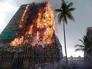Scaffolding at a temple tower in flames – thanks to fireworks of AIADMK party cadre. (Image : Temple Worshippers Society)